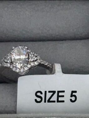 Charmed Aroma - Oval Halo Solitaire Ring in Silver-tone with Clear Stone